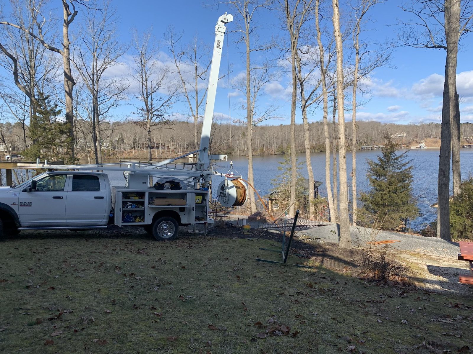 Clearwater Drilling service truck on a job at the lake